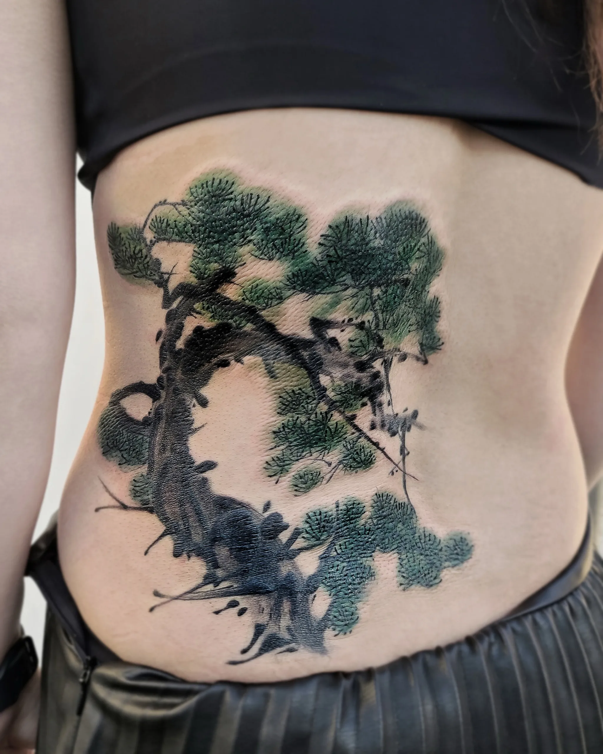 Pine Tree Cover-up — Pine tree tattoo detail